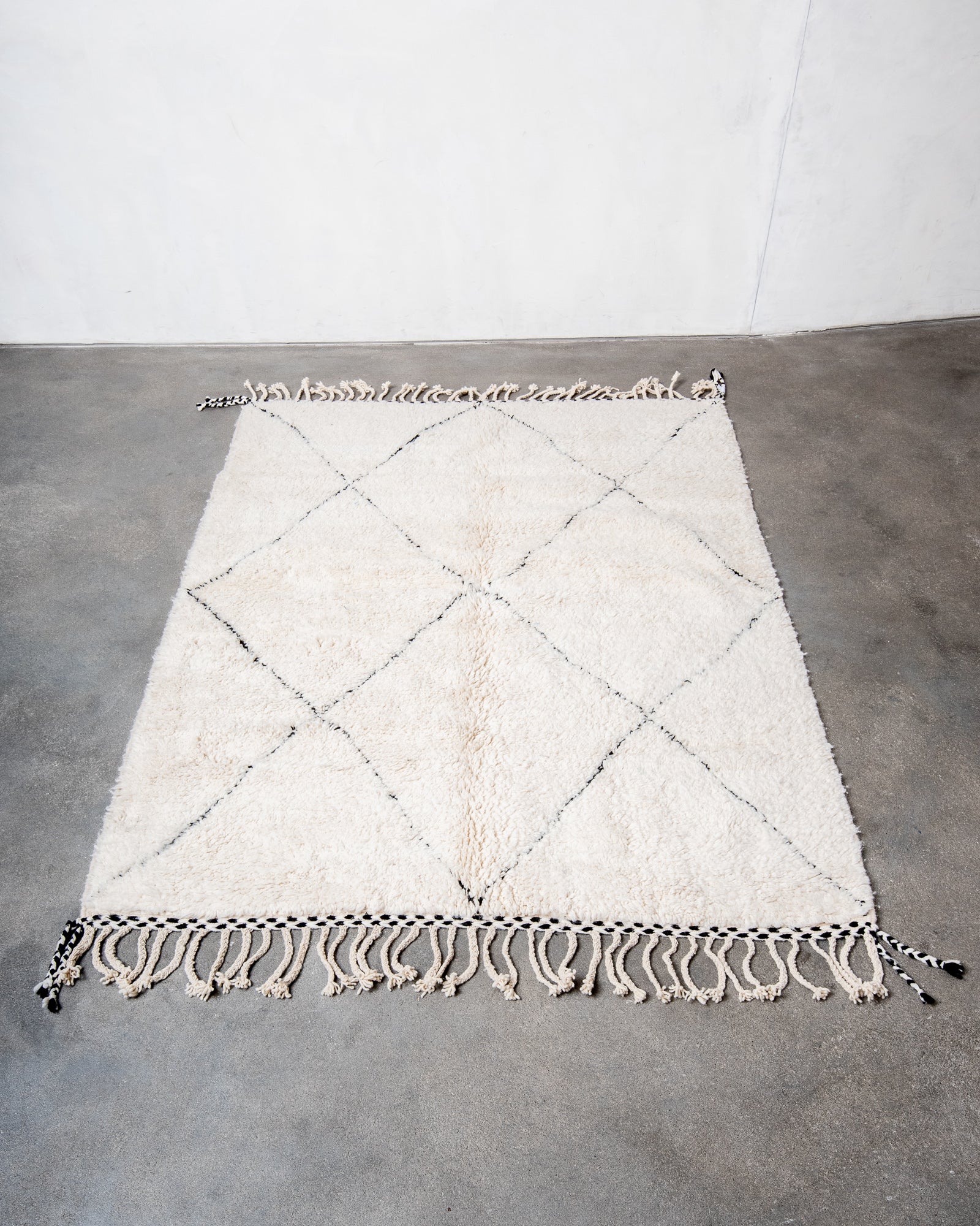 Modern, designer, handcrafted Berber rug from Morocco. Beniourain carpet with beautiful colours and patterns and fluffy wool texture.